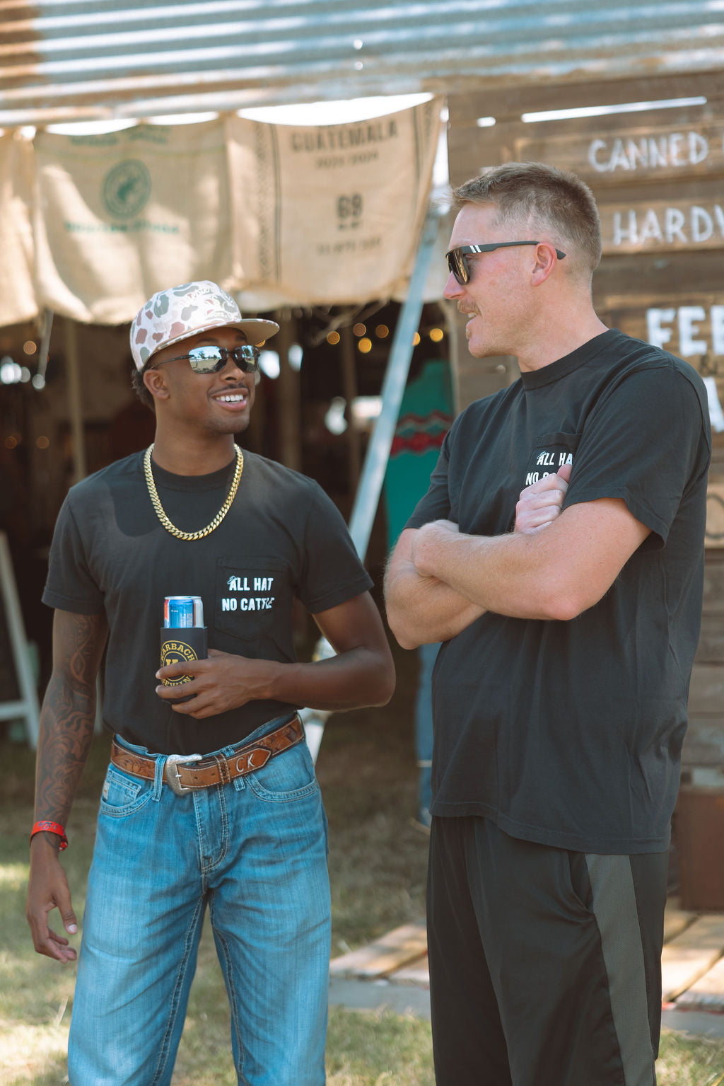 All Hat No Cattle T-shirt front two people wearing it